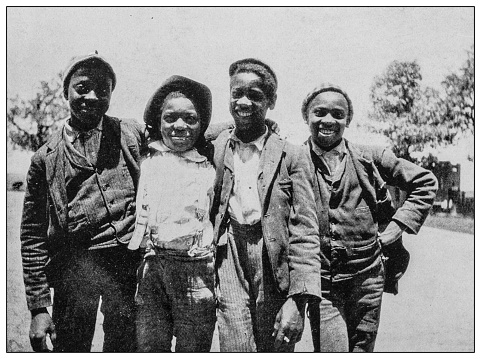 Antique black and white photo: Group of children in Southern USA