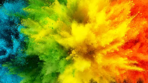 Photo of Abstract coloured powder explosion background