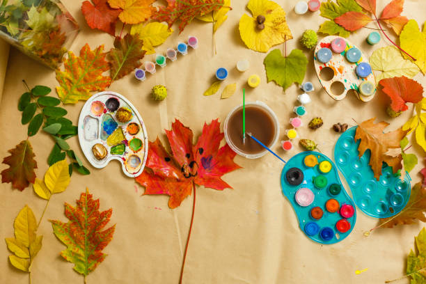 istock Autumn colorful background with leaves, gouache, arts 1257970232