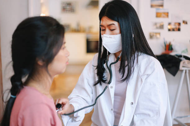 istock Doctor making a home visit to the patient 1257973415