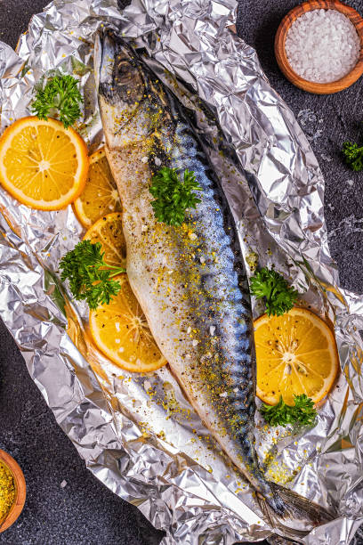 istock raw mackerel with spices in baking foil 1257973443