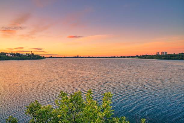 istock Summer Sunrise Over A Calgary Lake 1257977951