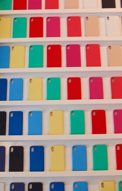 istock shelf with multi-colored cases for mobile phones 1257981150