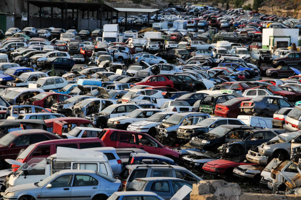 istock Old Junk Cars On Junkyard 1257982818