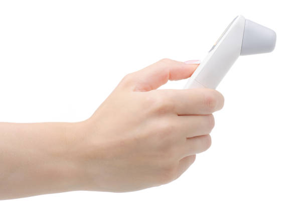 istock Hand holding non-contact digital thermometer 1257982975