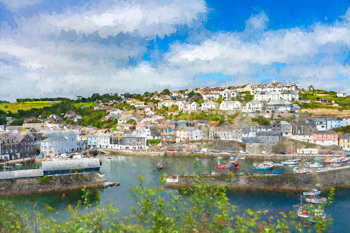 Mevagissey in Cornwall, England, UK.  This is a quaint Cornish fishing village with quintessential fishing harbour and fishing boats moored in the harbour. This is post processed to give a painterly effect.