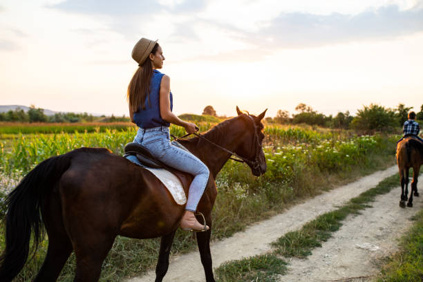 istock A woman riding a horse 1257990879