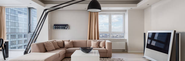 istock Luxury living room with television, panorama 1257997875