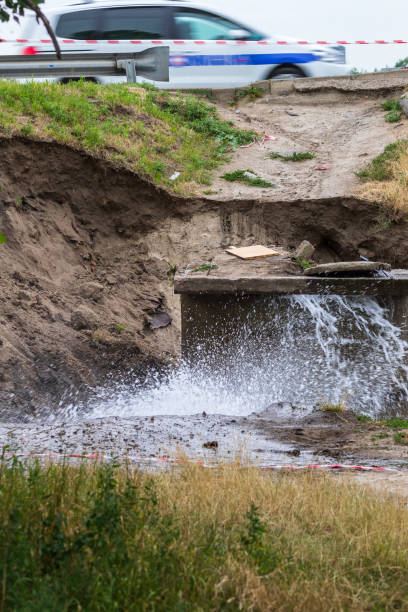 istock Accident sewerage system. Water supply failure. Breakthrough of the water supply system. A fountain of water flows out of the sewer under high pressure. 1257998187