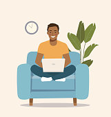 istock Young  afro American man sitting on the chair at home interior and working with laptop. Vector flat illustration 1257998329
