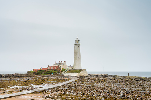 Whitley Bay, UK. St Mary's lighthouse causeway which was closed due to the coronavirus lock down.