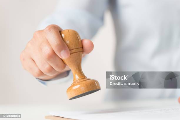 Stamping Document Stock Photo - Download Image Now - Shorthand, Certificate, Rubber Stamp