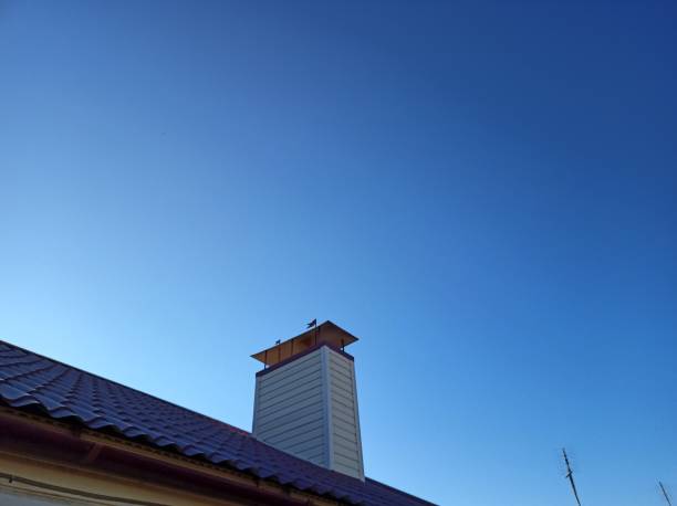 istock Chimney with blue sky on the background 1258008077