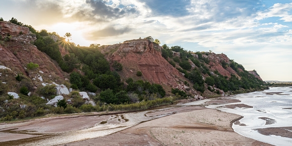 This is the Cimarron River and bluff at sunset. It is near the town of Freedom in western Oklahoma.