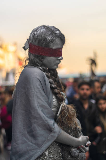 Izmir, Konak / Turkey-November 30 2017: Karsiyaka bazaar road (Karsiyaka Carsi) in Izmir. Street artist. Child bride themed performance show.