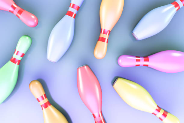 istock Colored bowling pins are scattered on the floor. View from above. 1258009506