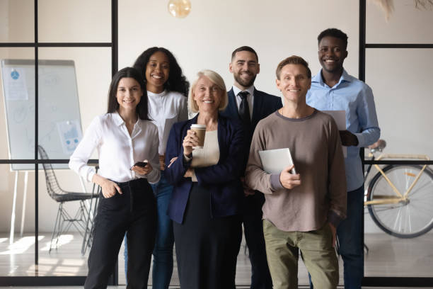 istock Portrait of diverse multiethnic employees posing together 1258010137