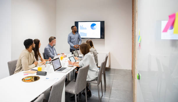 istock Group of young people on board meeting 1258011367