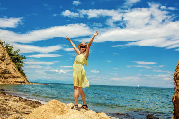 Woman on vacation having fun at the beach