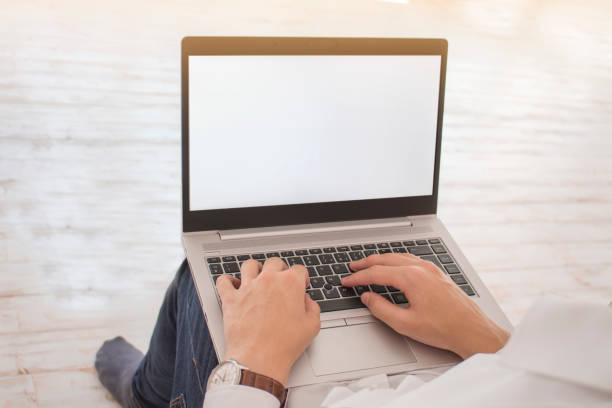 istock Handsome businessman working in his office 1258013830