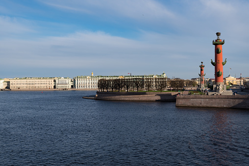 Spit of Vasilievsky Island with Rostral Columns. Winter palace and Neva River embankment at background. Sankt Peterburg, Russia