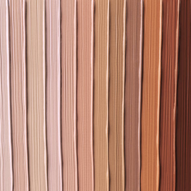 Skin tone foundation different colors cosmetic pattern background, gradient from dark to light skin color, BB cream stripes, 3d rendering. Skin tone foundation different colors cosmetic pattern background, gradient from dark to light skin color, BB cream stripes, 3d rendering. skin tones stock pictures, royalty-free photos & images