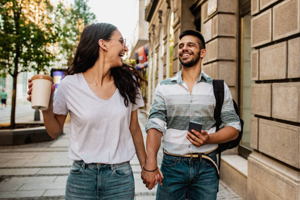 istock Couple walking in the city and having fun 1258016235