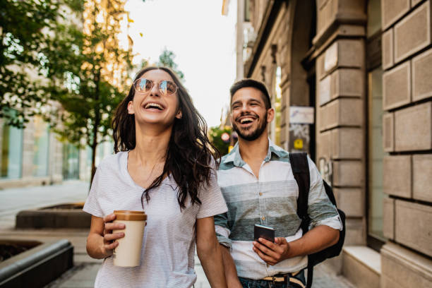 istock Couple walking in the city and having fun 1258016237