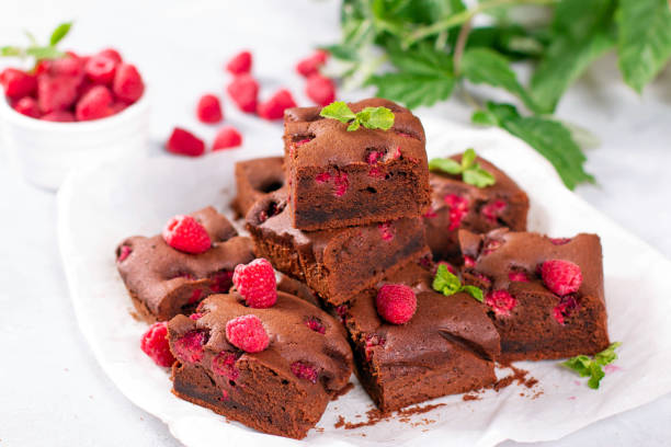 istock Chocolate brownie with berries and mint leaves 1258017116