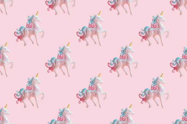 Samless pattern of beautiful pearl unicorn on soft pink background. Invitation, birthday, bachelorette party, baby shower concept. Girl birthday, magic surreal and minimal style.