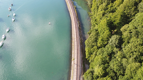 Drone still image of the River Dart and the Dartmouth Steam Railway.