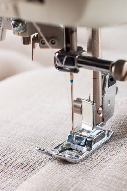istock Close-up of modern sewing machine presser foot and needle 1258025885