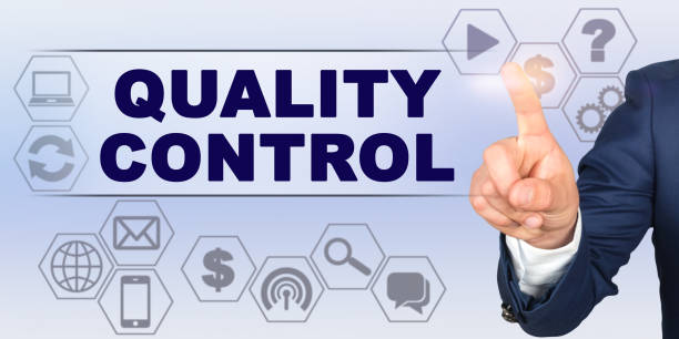 istock Businessman touching virtual screen with his finger. Screen caption - QUALITY CONTROL 1258030987