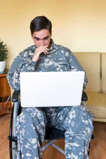 istock War Veteran is Communicating over the Laptop 1258035696