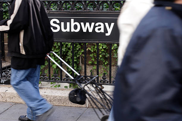 istock Subway Entrance with People 125803651