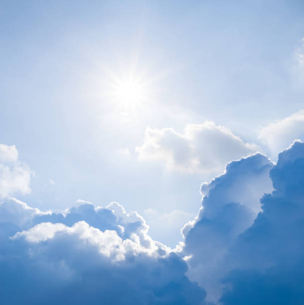 istock sparkle sun among a dense cumulus clouds, natural background 1258038030