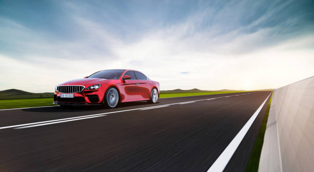 istock car driving on a road 1258044292