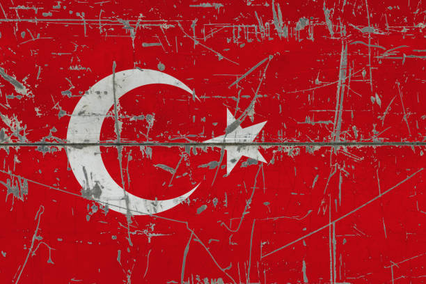 istock Turkey flag painted on cracked dirty surface. National pattern on vintage style surface. Scratched and weathered concept. 1258044956