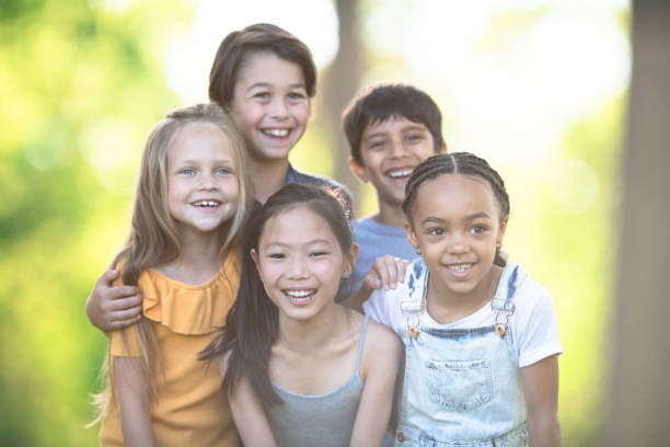 istock Portrait of diverse friend group smiling 1258045120