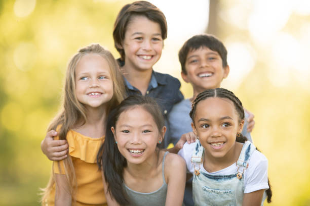 istock Portrait of diverse friend group smiling 1258045144