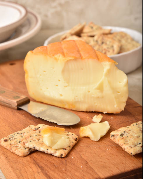 istock A wedge of autumn cheese with crackers 1258051440
