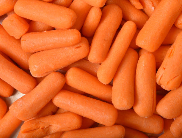 istock Washed and peeled baby carrots 1258051485