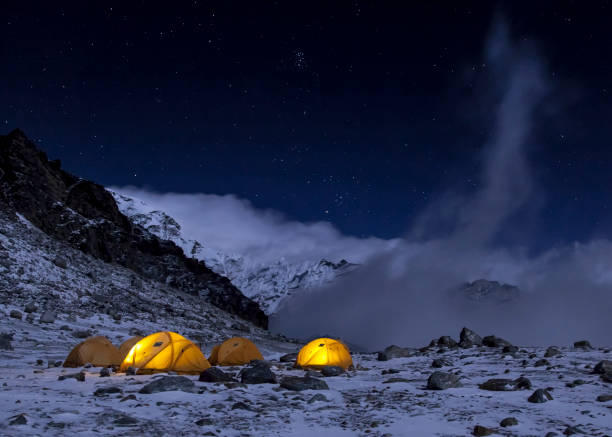 Mera Base Camp A sleepless night at 17000 feet. base camp stock pictures, royalty-free photos & images