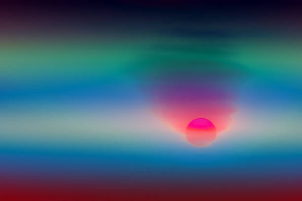istock abstract colorful sunset back on silhouette dry tree dark red cloud on sky 1258073864