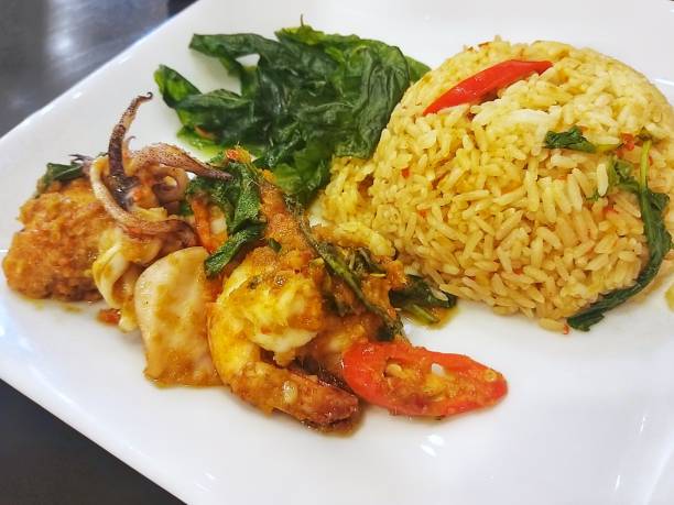 istock Close up spicy fried rice with seafood. 1258074039