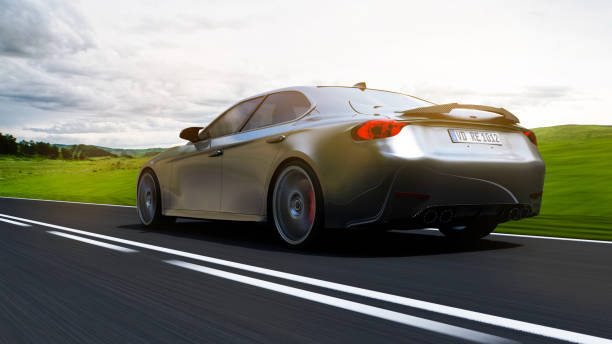 istock car driving on a road 1258076481