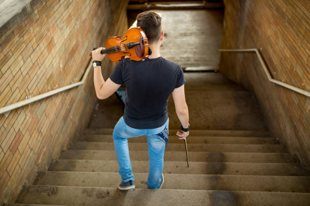 istock Violin street performer 1258082635