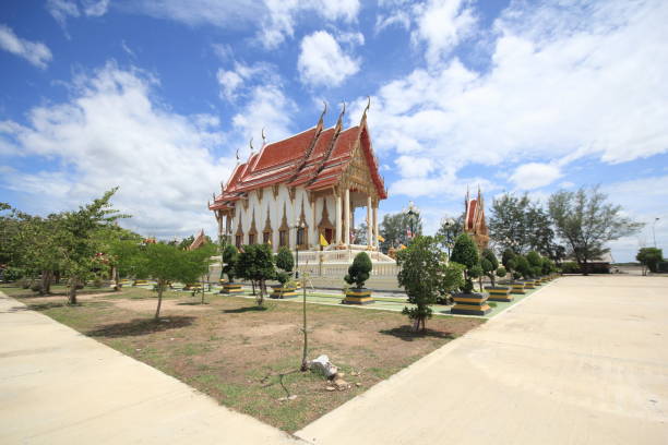 istock Thai rice fields and temples in Phetchaburi Province, Thailand 1258083309