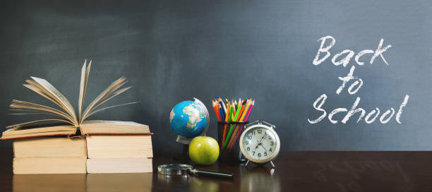 istock Back to School Concept with Stationery and Blackboard 1258088371