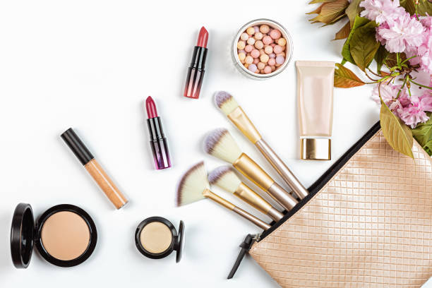 istock Cosmetic products on white background with copy space. Flat lay, top view 1258090795